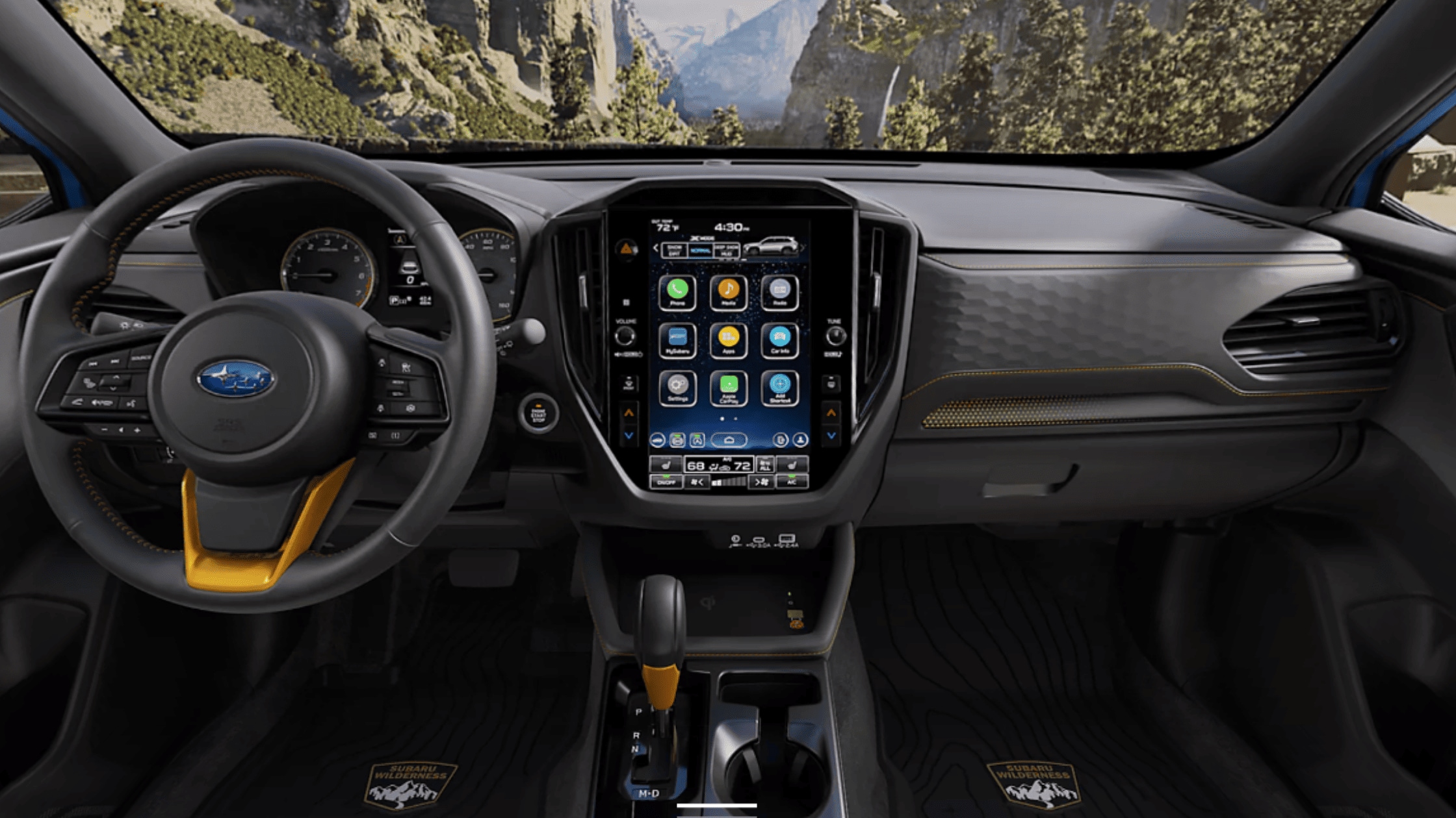 2026 Subaru Outback Wilderness cargo area loaded with camping gear including sleeping bag and trekking poles with rear hatch open in a desert setting