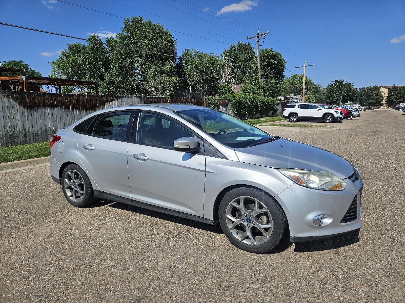 Used 2014 Ford Focus SE with VIN 1FADP3F20EL339005 for sale in Pueblo, CO