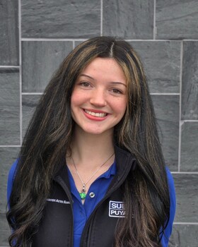 Staff member Alexa Carnes from ID_845999