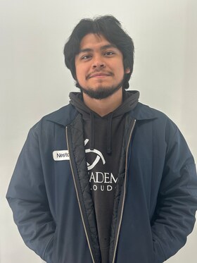 Staff member Nestor Cruz from 1a363c4db4f6