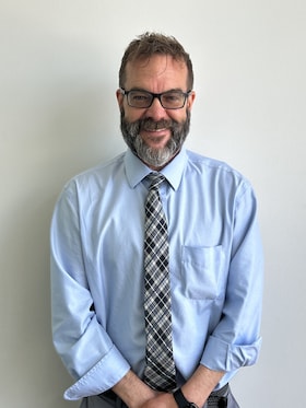Staff member Ryan Sturdivant from d7472686459a
