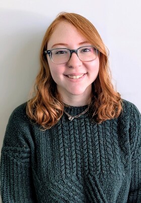 Staff member Emma Shainline from cb06aa93d19f