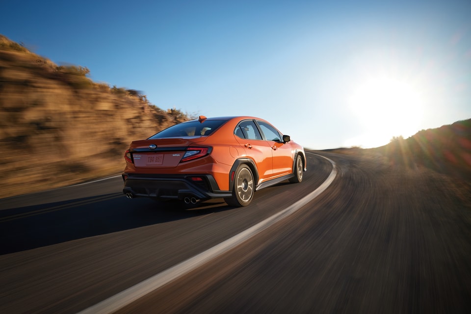  New Subaru WRX Orange rear angle view