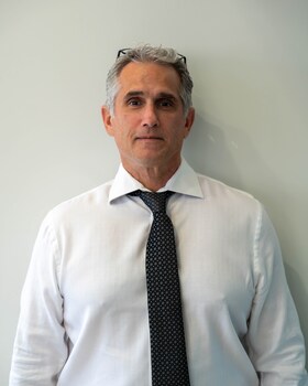 Staff member Charles Samaha from d7472686459a