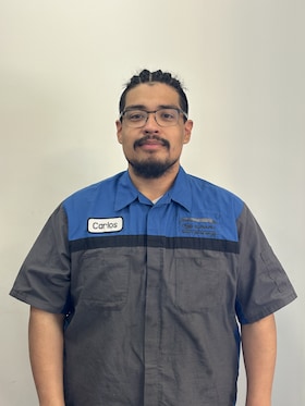 Staff member Carlos Saenz from 1a363c4db4f6