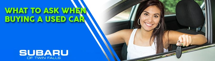 buying a used car in Twin Falls girl holding keys to a used car