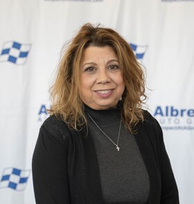 Staff member Maria Malave from ID_a03b8e39c9d0