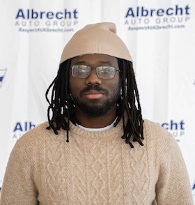 Staff member Caleb Dolcius from ID_a03b8e39c9d0