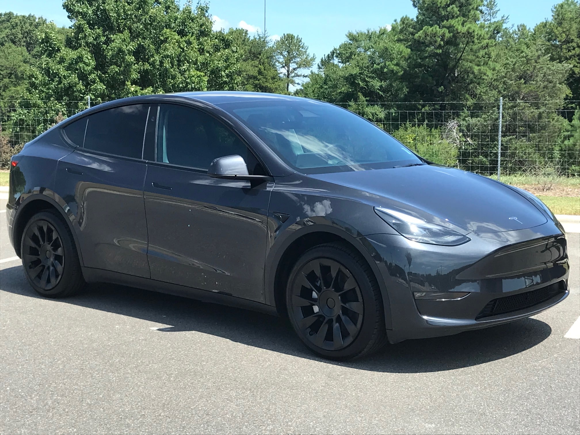 Used 2024 Tesla Model Y Long Range with VIN 7SAYGDEE5RF993409 for sale in Pineville, NC