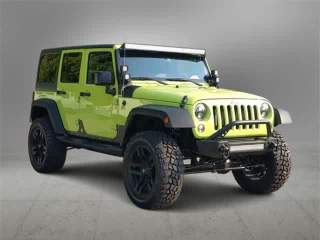 Used 2016 Jeep Wrangler Unlimited Sport S with VIN 1C4BJWDG9GL300385 for sale in Ann Arbor, MI