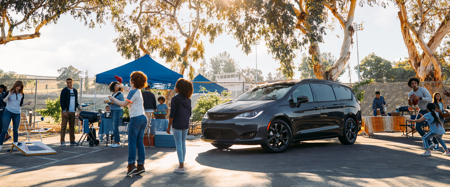 Chrysler Lifestyle Black 2020 Chrysler Pacifica standing in the middle of an annual outdoor meeting
