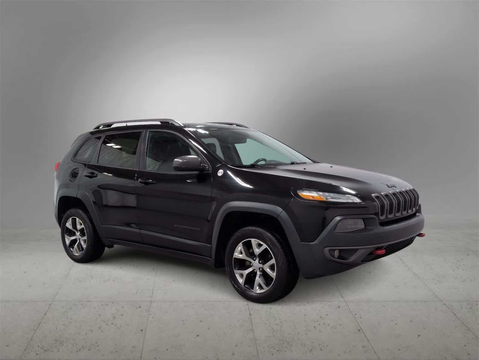 Used 2017 Jeep Cherokee Trailhawk with VIN 1C4PJMBBXHW517333 for sale in Farmington Hills, MI