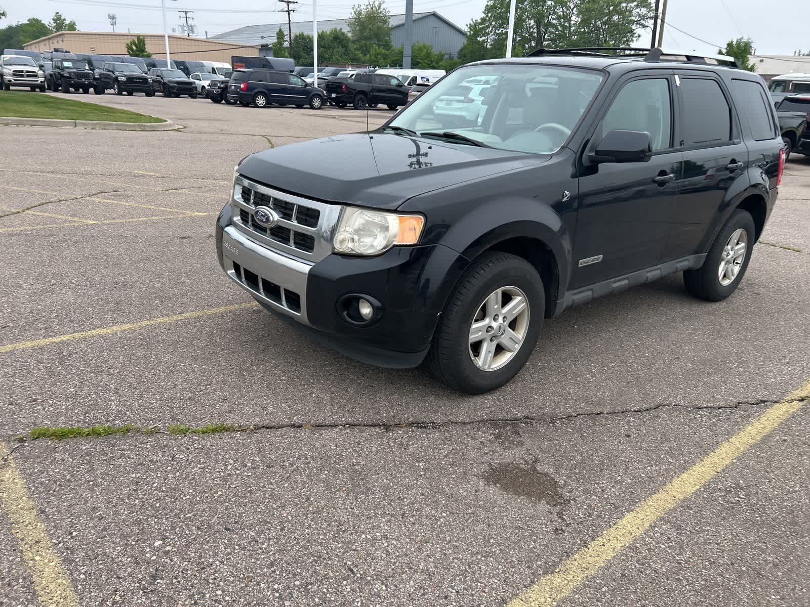 Used 2008 Ford Escape Hybrid with VIN 1FMCU49H68KA00145 for sale in Farmington, MI