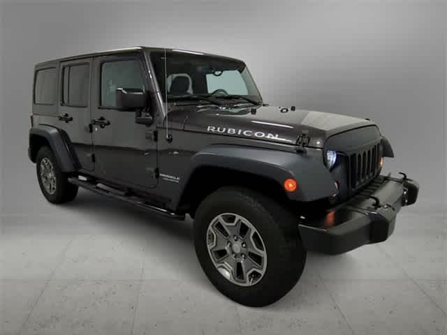 Used 2017 Jeep Wrangler Unlimited Rubicon with VIN 1C4BJWFG7HL526164 for sale in Farmington, MI