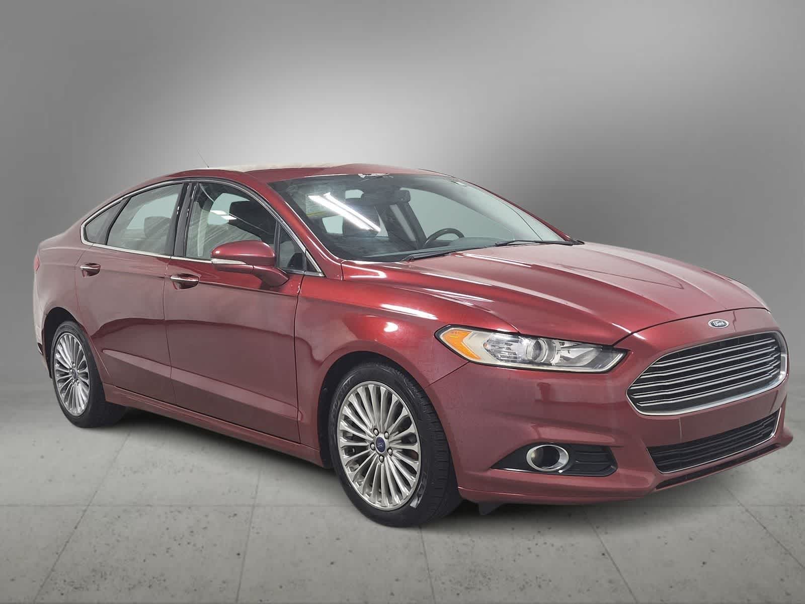 Used 2014 Ford Fusion Titanium with VIN 3FA6P0D99ER245424 for sale in Farmington Hills, MI