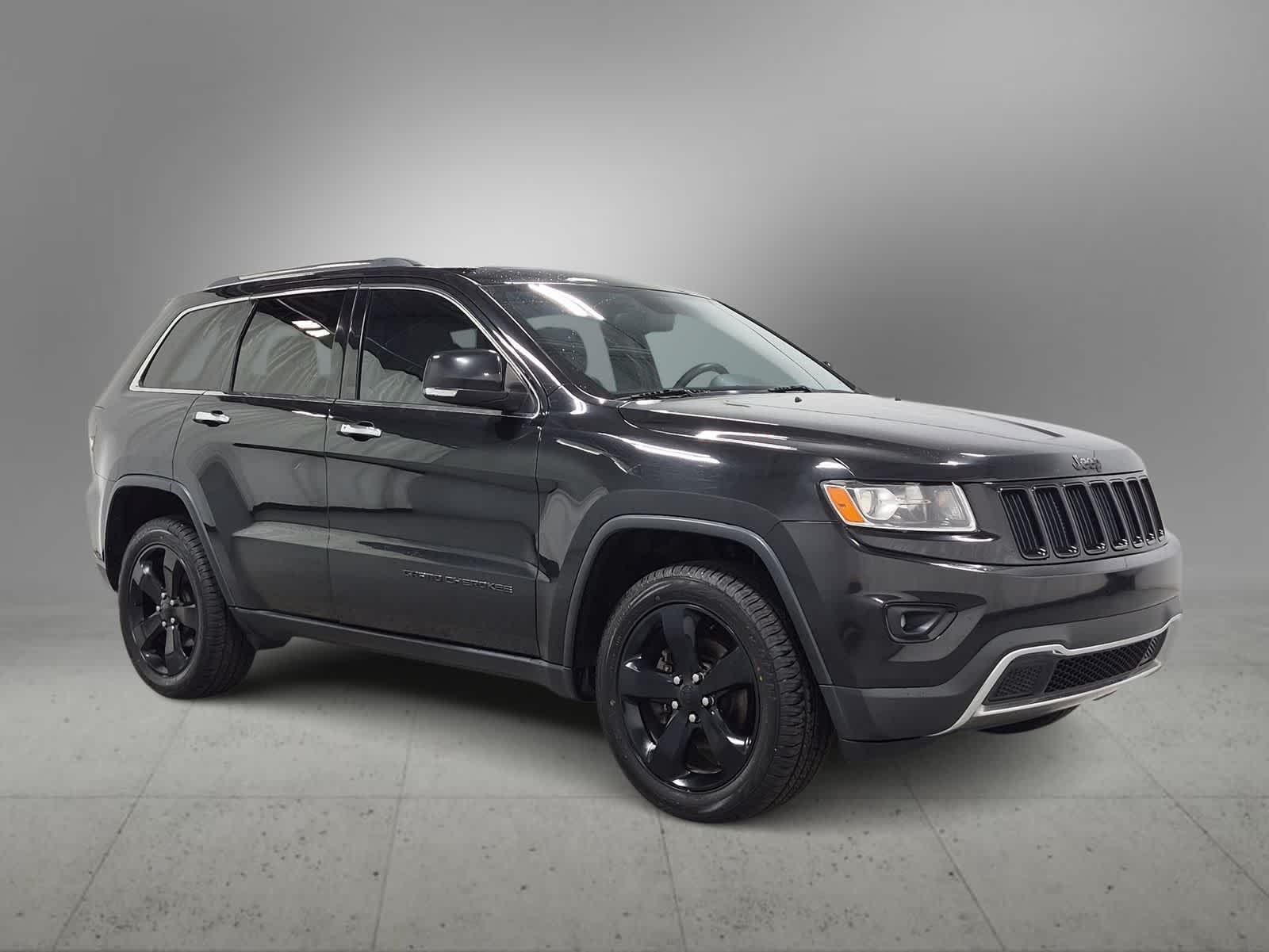 Used 2014 Jeep Grand Cherokee Limited with VIN 1C4RJFBGXEC463576 for sale in Farmington Hills, MI