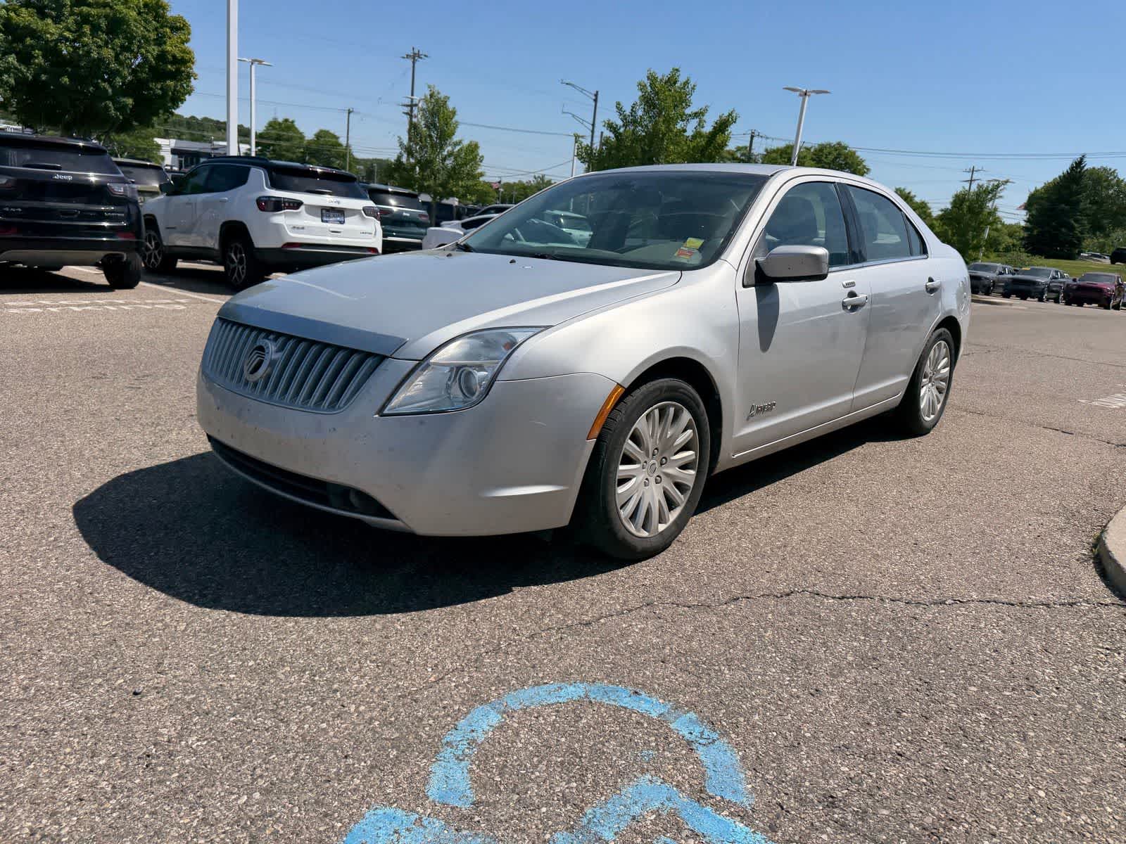 Used 2011 Mercury Milan Hybrid with VIN 3MEDM0L33BR602002 for sale in Farmington Hills, MI