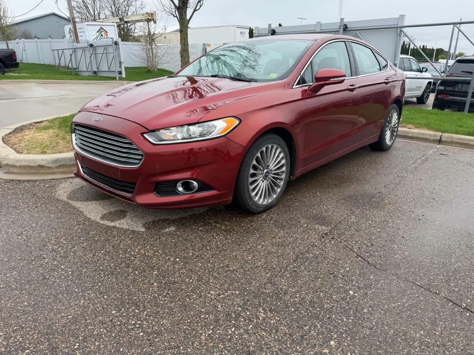 Used 2014 Ford Fusion Titanium with VIN 3FA6P0D99ER245424 for sale in Farmington Hills, MI