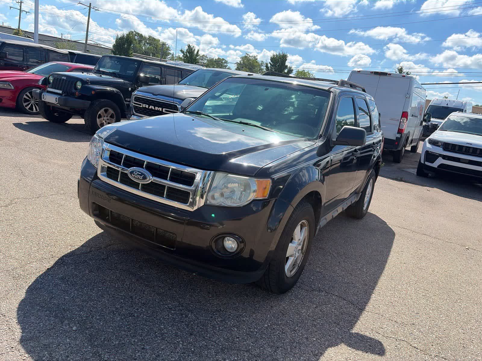 Used 2010 Ford Escape XLT with VIN 1FMCU9D74AKB93137 for sale in Farmington Hills, MI