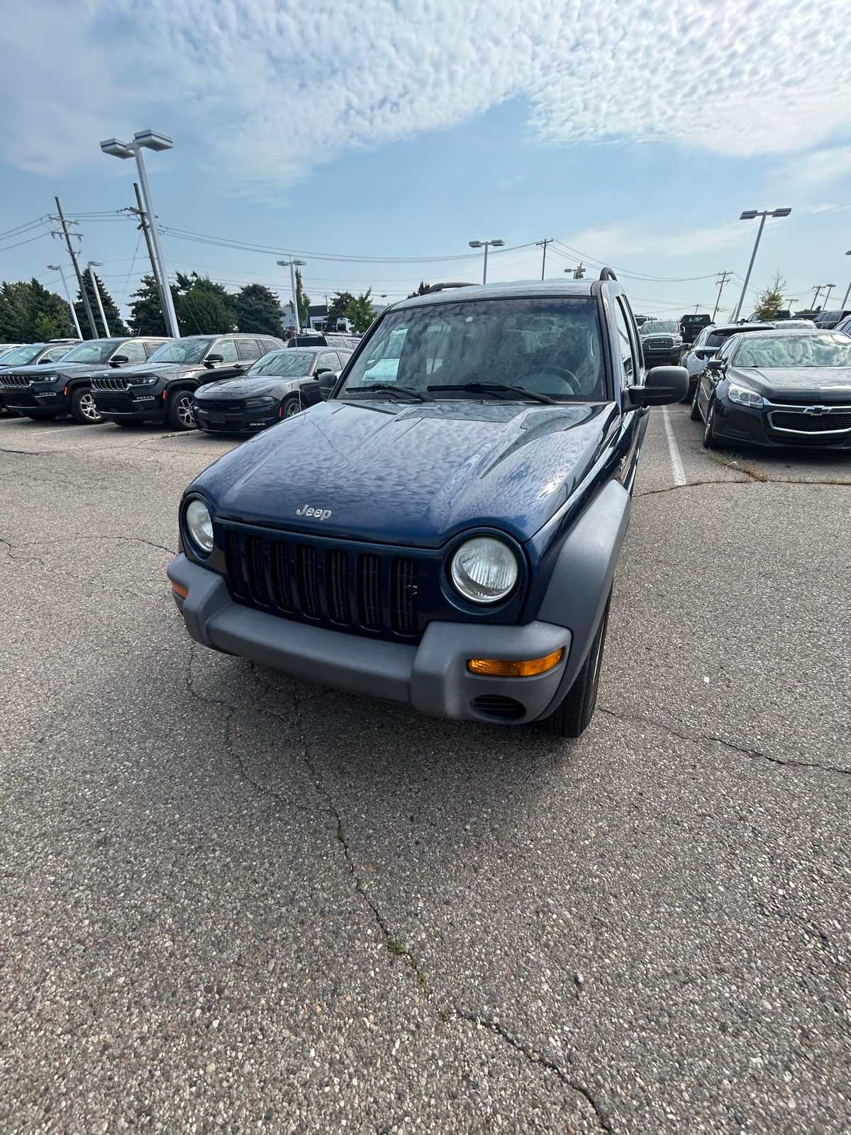 Used 2002 Jeep Liberty Sport with VIN 1J4GL48K22W281831 for sale in Farmington Hills, MI