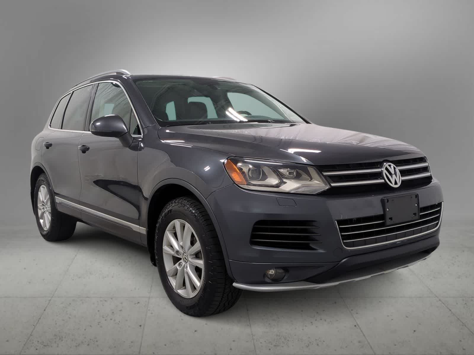 Used 2014 Volkswagen Touareg Sport with VIN WVGEF9BP7ED007316 for sale in Farmington Hills, MI