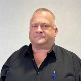 Staff member Tony Cawson from ID_33dfbcc864d0
