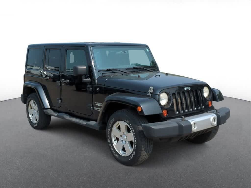 Used 2011 Jeep Wrangler Unlimited Sahara with VIN 1J4BA5H19BL568792 for sale in Troy, MI