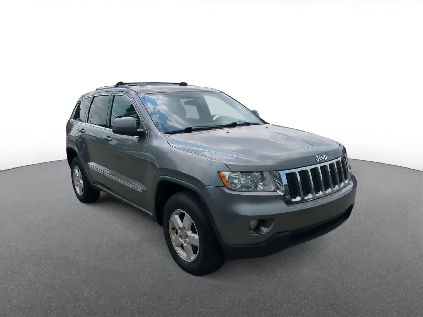 Used 2012 Jeep Grand Cherokee Laredo with VIN 1C4RJFAG2CC200948 for sale in Troy, MI