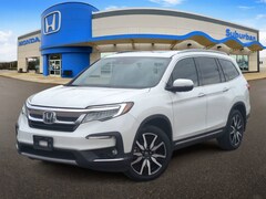 Pre-owned 2021 Honda Pilot Touring 8-Passenger SUV in Farmington Hills, MI