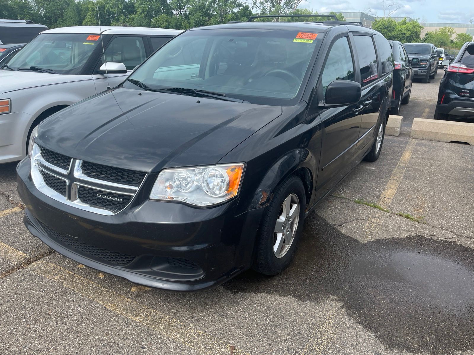 Used 2012 Dodge Grand Caravan SXT with VIN 2C4RDGCG1CR212073 for sale in Sterling Heights, MI
