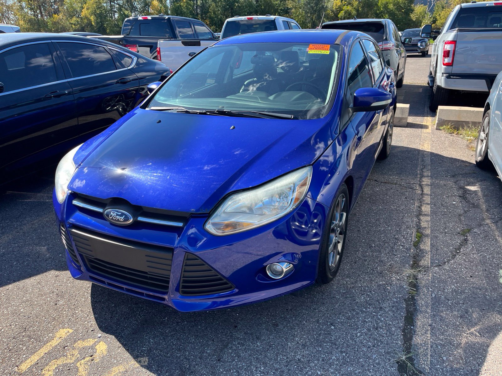 Used 2014 Ford Focus SE with VIN 1FADP3K27EL107796 for sale in Sterling Heights, MI