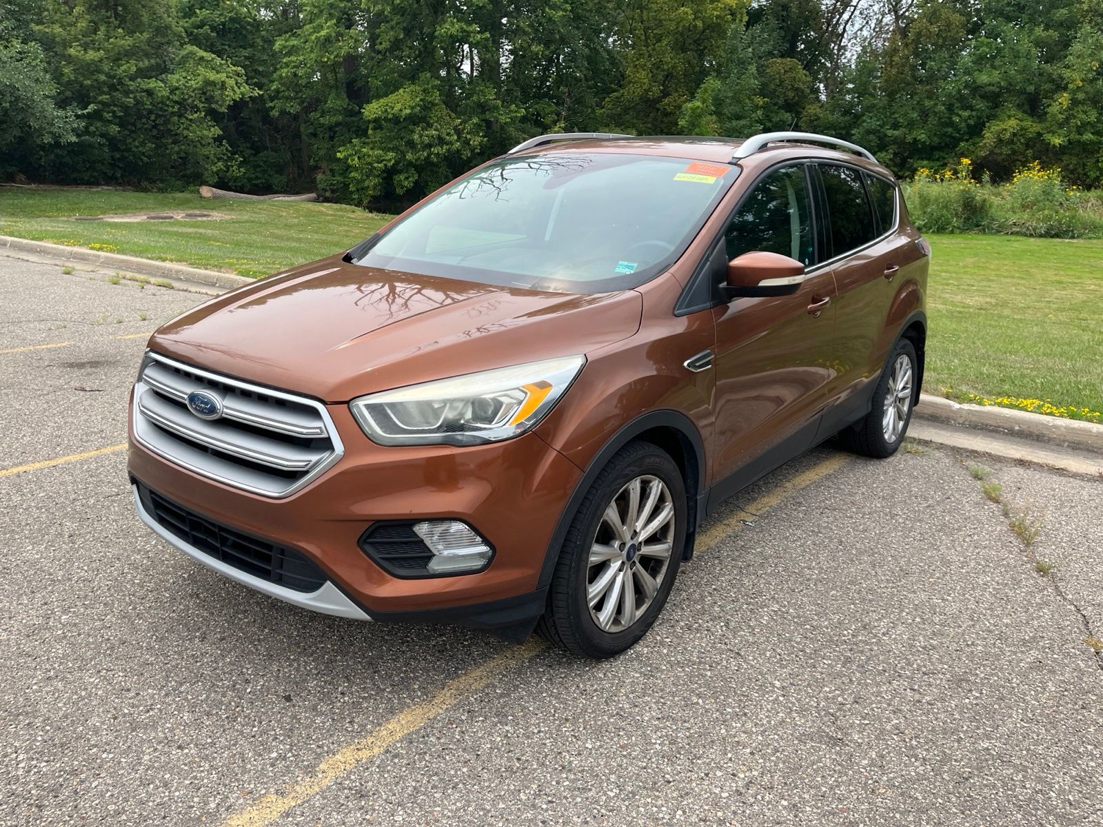 Used 2017 Ford Escape Titanium with VIN 1FMCU0JD2HUA12878 for sale in Sterling Heights, MI