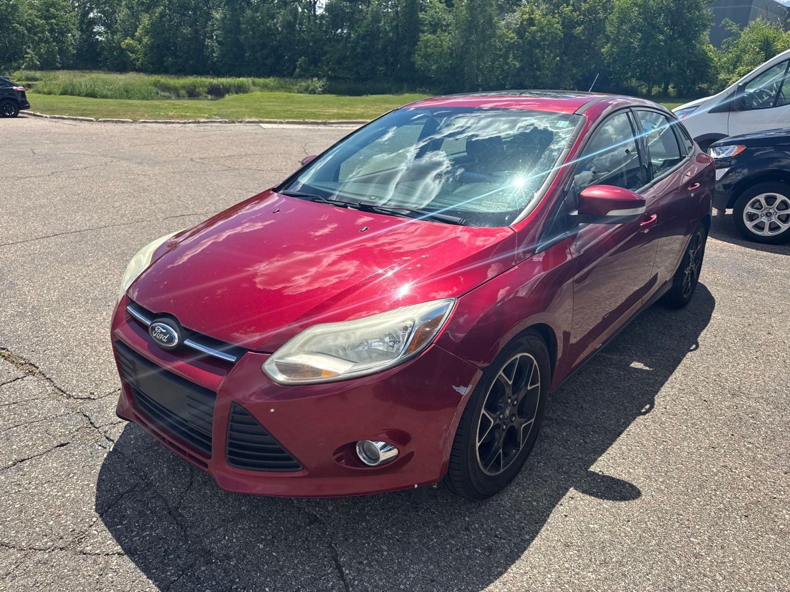 Used 2013 Ford Focus SE with VIN 1FADP3F24DL137511 for sale in Sterling Heights, MI