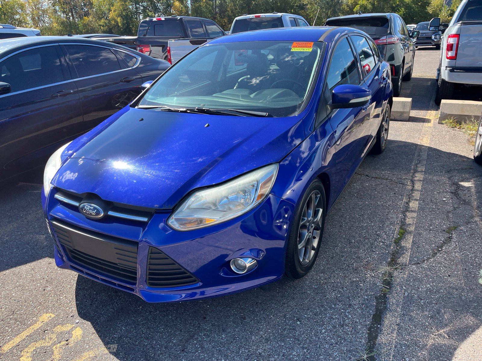 Used 2014 Ford Focus SE with VIN 1FADP3K27EL107796 for sale in Sterling Heights, MI