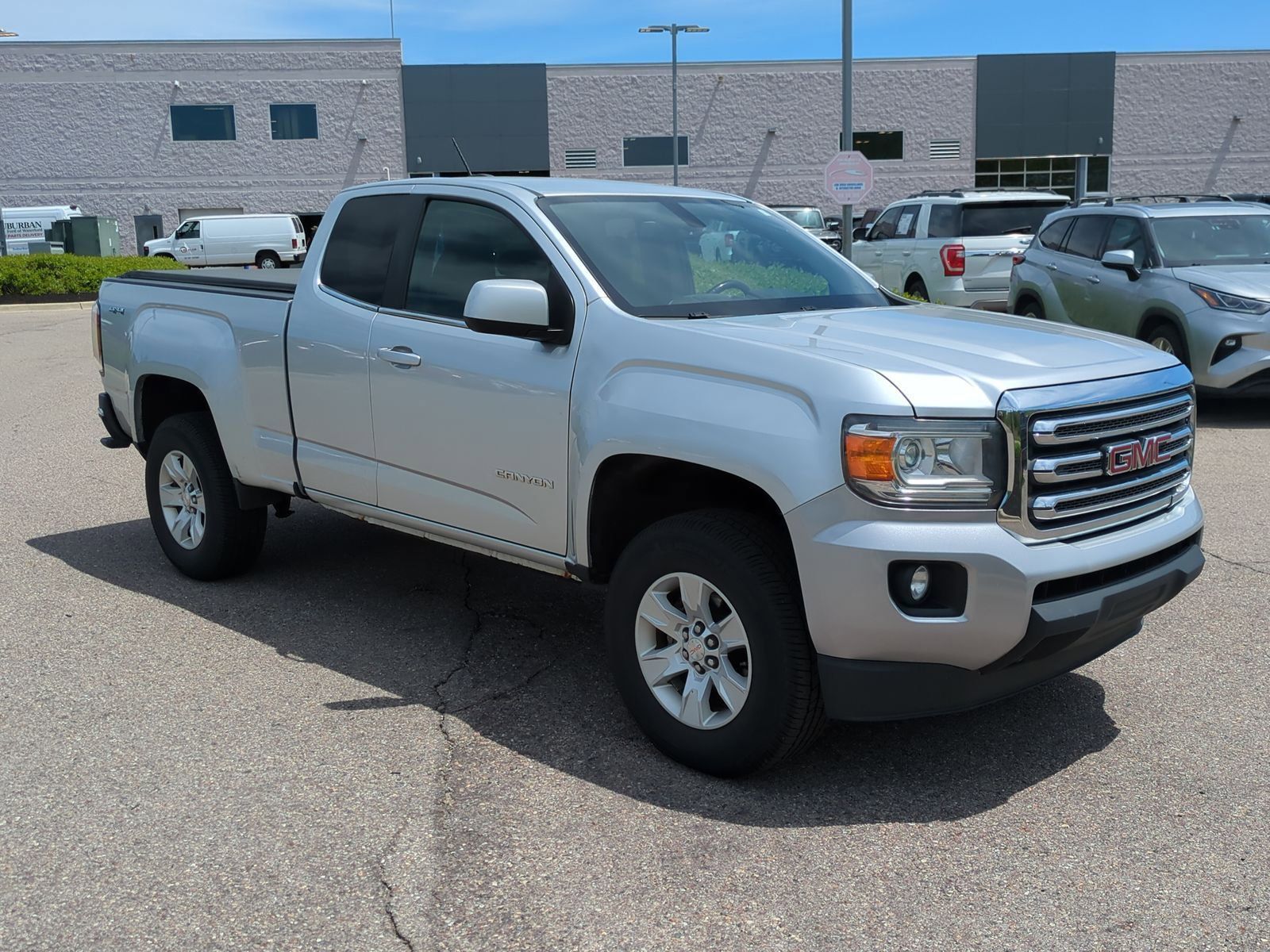 Used 2015 GMC Canyon SLE with VIN 1GTH6BE34F1148980 for sale in Waterford Township, MI