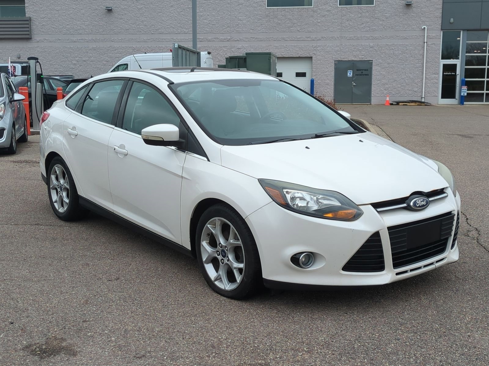 Used 2013 Ford Focus Titanium with VIN 1FADP3J21DL233121 for sale in Waterford, MI