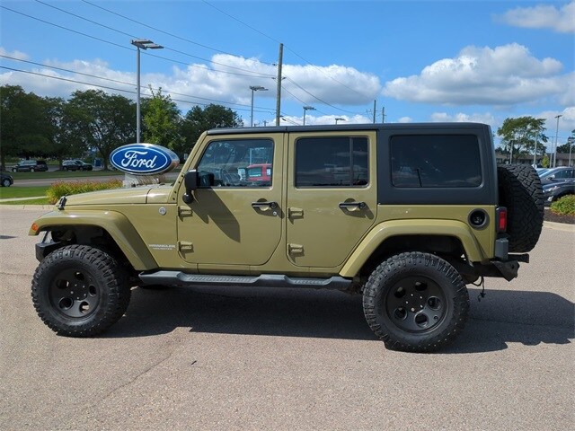 Used 2013 Jeep Wrangler Unlimited Sahara with VIN 1C4BJWEG1DL568308 for sale in Waterford, MI