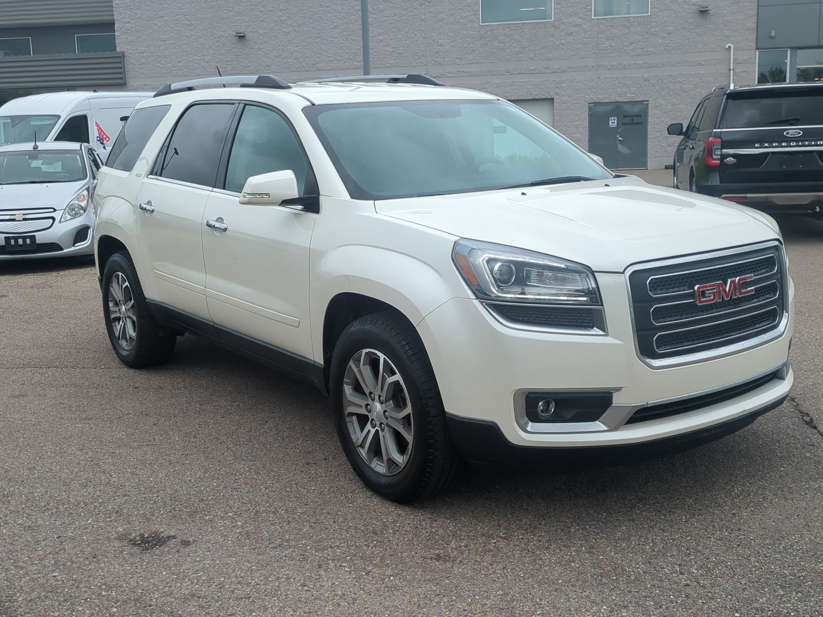 Used 2014 GMC Acadia SLT1 with VIN 1GKKRRKDXEJ309757 for sale in Waterford, MI