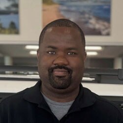 Staff member Chris Sutton from ID_53dbec05827c