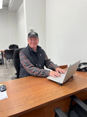 Staff member John Woodman from 63fc541c182b