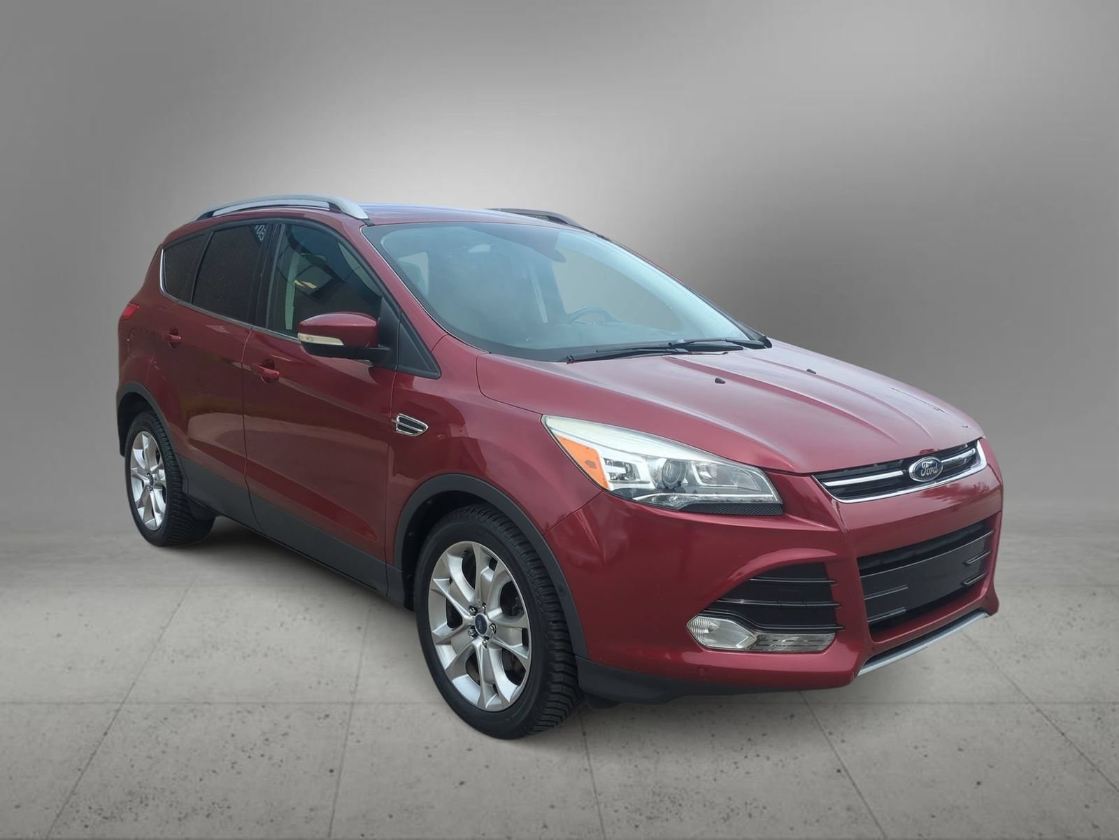 Used 2014 Ford Escape Titanium with VIN 1FMCU0JX7EUC74692 for sale in Farmington Hills, MI