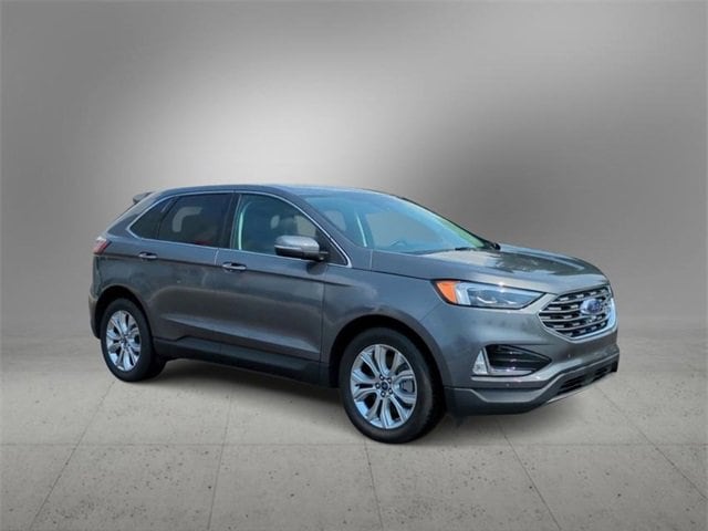 Used 2022 Ford Edge Titanium with VIN 2FMPK4K93NBB04429 for sale in Farmington, MI