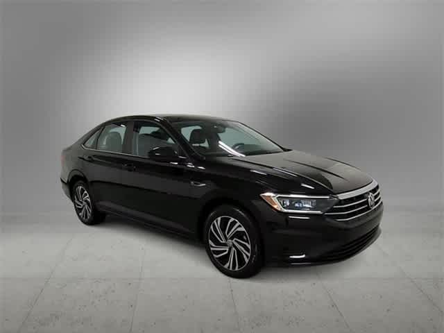 Used 2021 Volkswagen Jetta SEL with VIN 3VWE57BU2MM070387 for sale in Farmington, MI