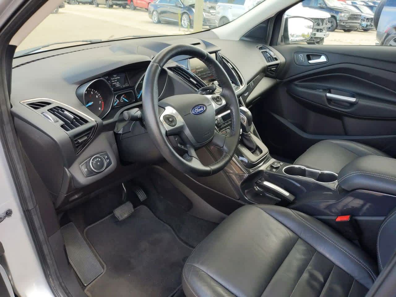 Used 2015 Ford Escape Titanium with VIN 1FMCU9JX6FUB77036 for sale in Troy, MI