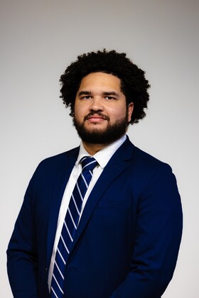 Staff member Alexander Dew from ID_654c94