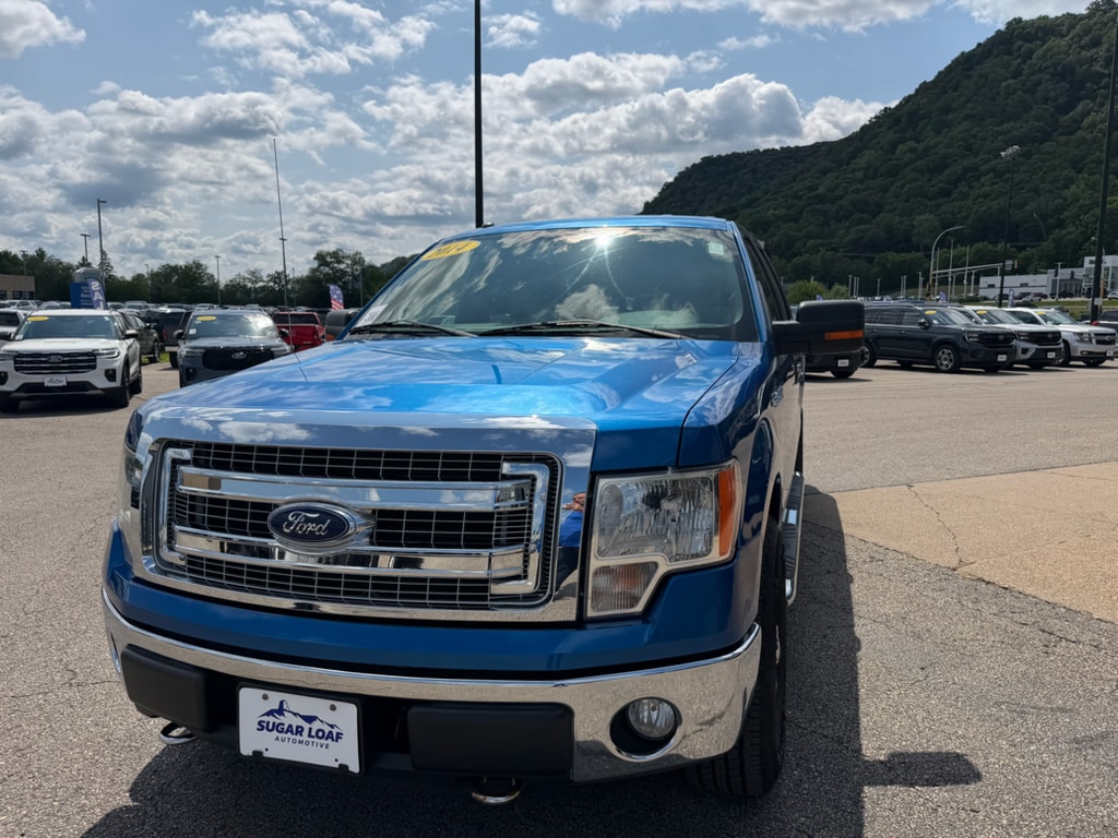 Used 2014 Ford F-150 XLT with VIN 1FTFW1EFXEKD39243 for sale in Winona, Minnesota