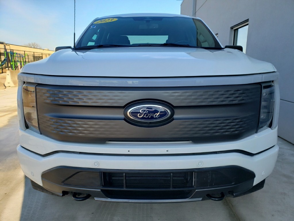 Used 2023 Ford F-150 Lightning XLT with VIN 1FT6W1EV7PWG35064 for sale in Winona, Minnesota