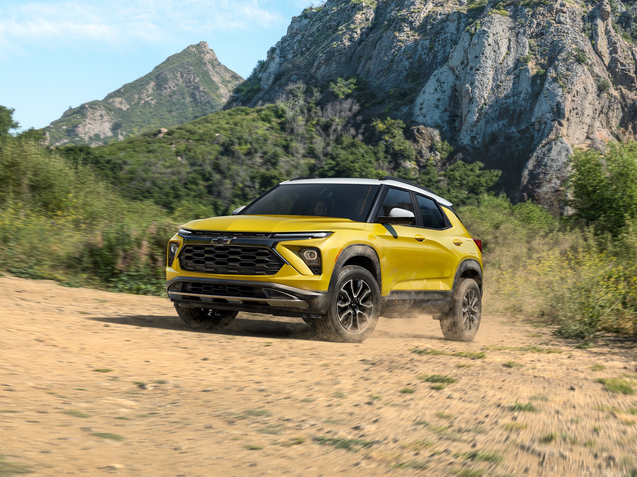Chevy Trailblazer driving on dirt road