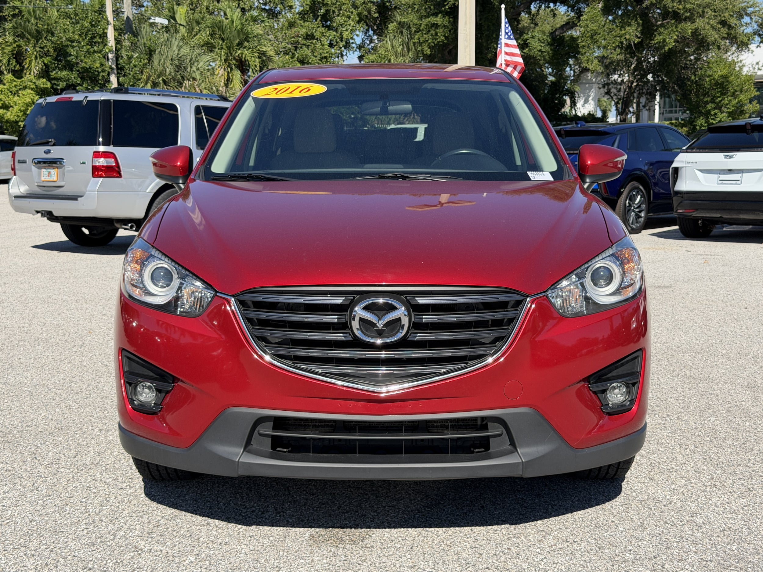Used 2016 Mazda CX-5 Touring with VIN JM3KE2CY5G0847041 for sale in Sarasota, FL