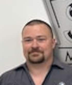 Staff member Tom Dennis from ID_85f166